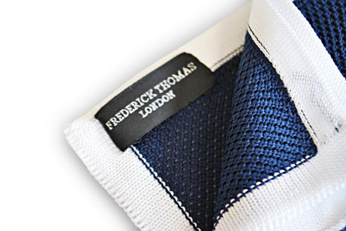 navy blue knitted pocket square with white edging